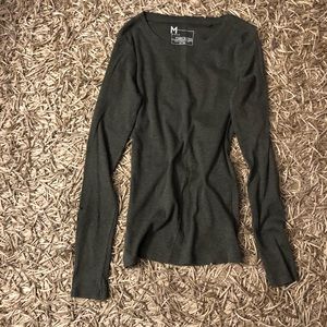 Long sleeve shirt. Size Medium, to me more like Small or even XSmall.